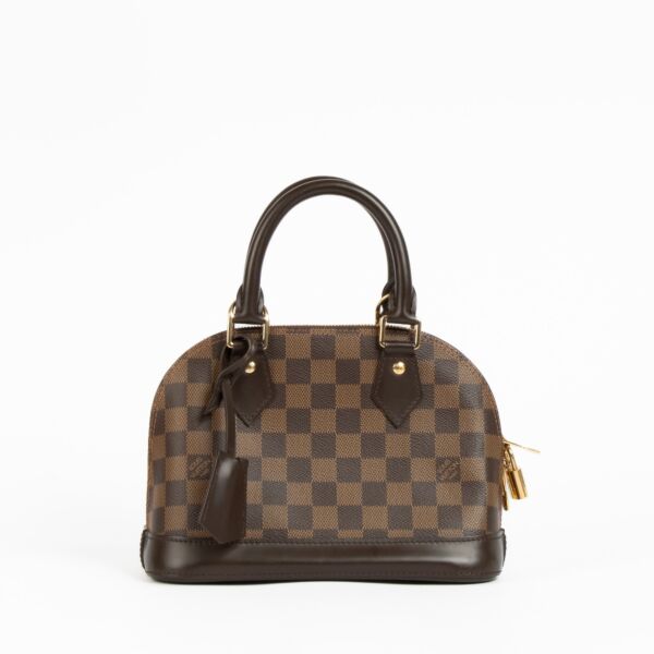 Authentic pre-loved Louis Vuitton Damier Ebene Canvas Alma BB on Labellov.com
