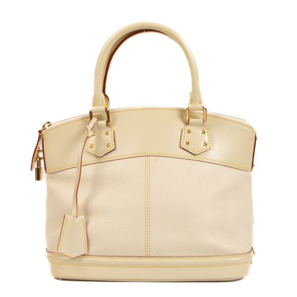 Shop 100% authentic second-hand Louis Vuitton Cream Suhali Lockit Bag on Labellov.com