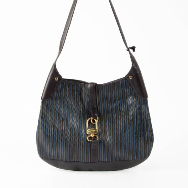 Authentic pre-loved Delvaux Purple Toile de Cuir Treille Shoulder Bag on Labellov.com