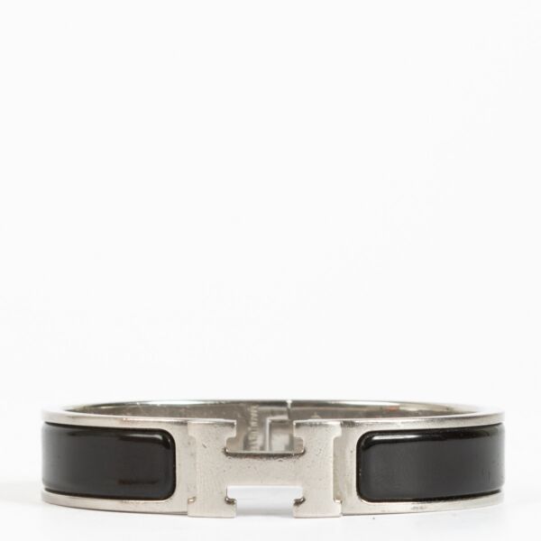 Shop the authentic Hermès Clic H PM Bracelet in black enamel with palladium hardware at Labellov