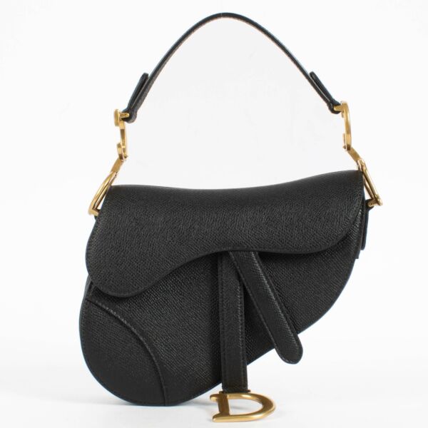 Shop the authentic Christian Dior Black Leather Mini Saddle Bag second hand on Labellov.com