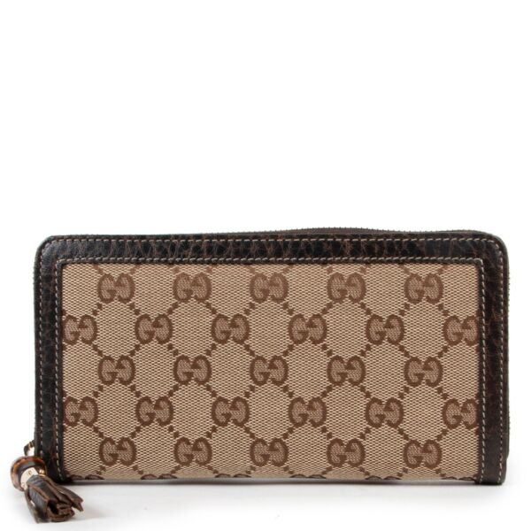 100% authentic Gucci monogram wallet