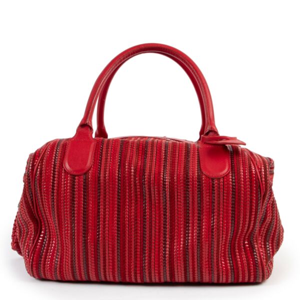 Buy these Delvaux Napoli Red Toile De Cuir Top handle for a reasonable  price at Labellov online or in store. Koop deze Delvaux Napoli Red Toile De Cuir Top handlevoor een redelijke prijs bij Labellov online of in de winkel. 