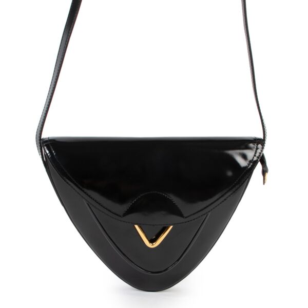 Shop safe online 100% authentic second hand Delvaux Black Patent Leather Triangle Crossbody Bag in very good condition at the right price at Labellov in Antwerp.