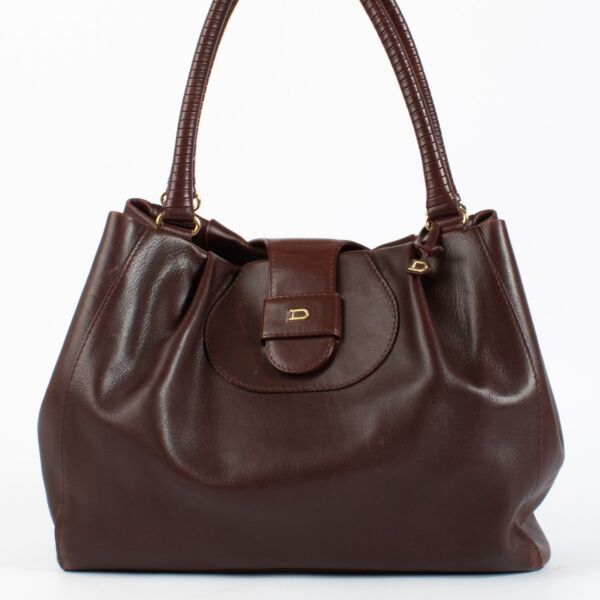 Delvaux Sellier bag in Pinot Clair Obscur Box Calf leather with gold hardware. A structured, elegant Delvaux icon in excellent pre-loved condition.