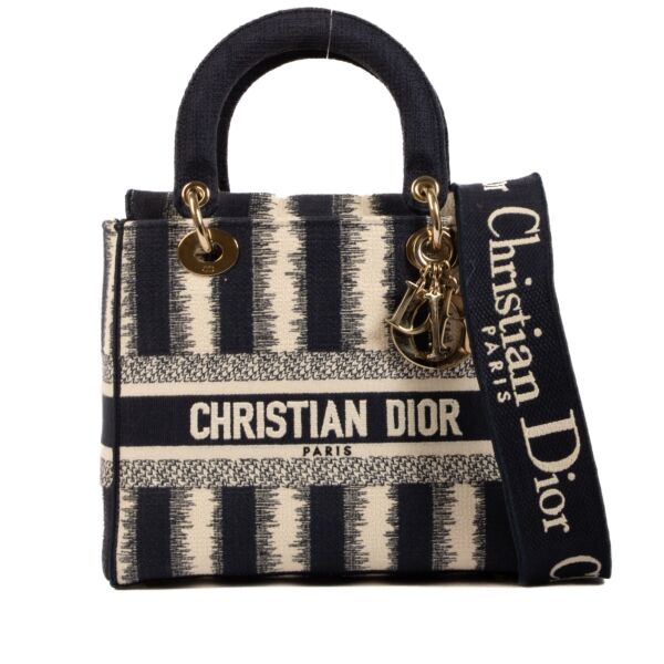 Shop safe online at Labellov in Antwerp, Brussels and Knokke this 100% authentic second hand Christian Dior Blue and Beige Striped Lady D-Lite Top Handle