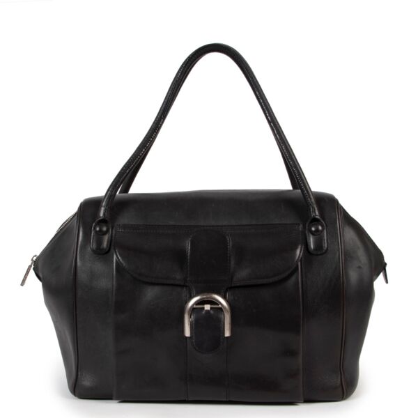Buy online an authentic second hand Delvaux black Brillant 12H Fauve Bourgogne Bag in preloved condition at Labellov in Antwerp. 