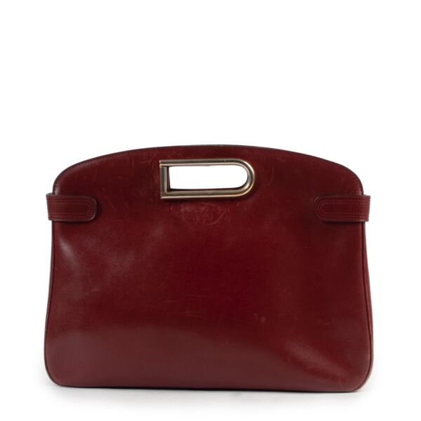 Shop safe online at labellov in Antwerp this 100% authentic second hand preloved Delvaux Burgundy Clutch