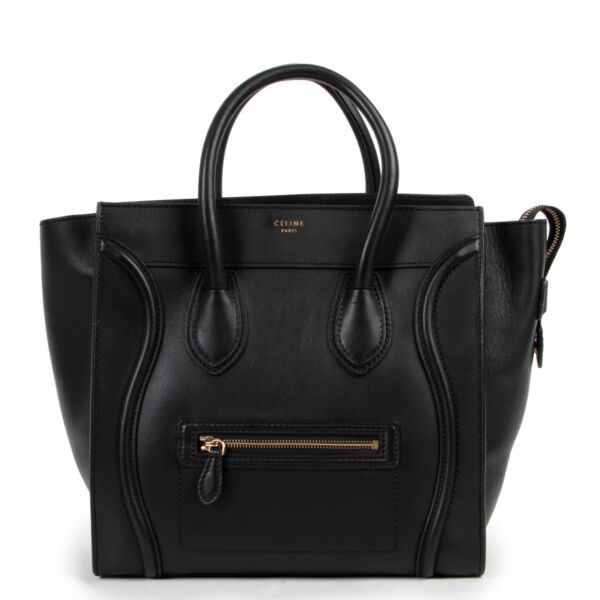 Celine black top handle luggage leather bag for the best price at Labellov secondhand luxury n Antwerp. 