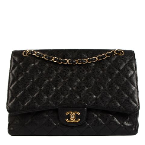 Chanel Black Maxi Caviar Classic Single Flap Bag for the best price at Labellov secondhand luxury in Antwerp. We buy and sell your preloved and brand new designer bags for the best price. 