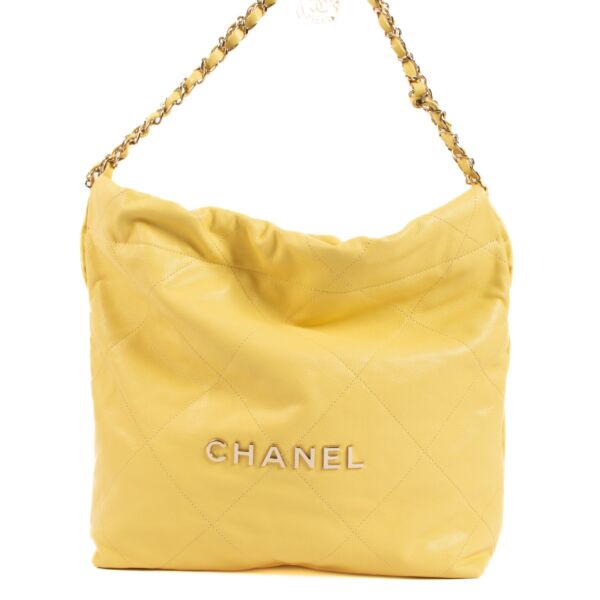 Shop safe online at Labellov in Antwerp, Brussels and Knokke this 100% authentic second hand Chanel Yellow 22 Small Bag