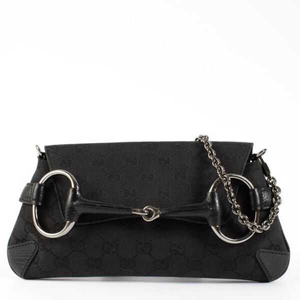 Shop 100% authentic second hand Gucci Black GG Canvas Horsebit Chain Bag on Labellov.com