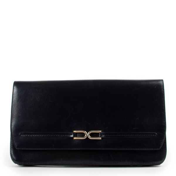Delvaux Dark Blue Clutch
Buy this gorgeous Delvaux clutch here safely!