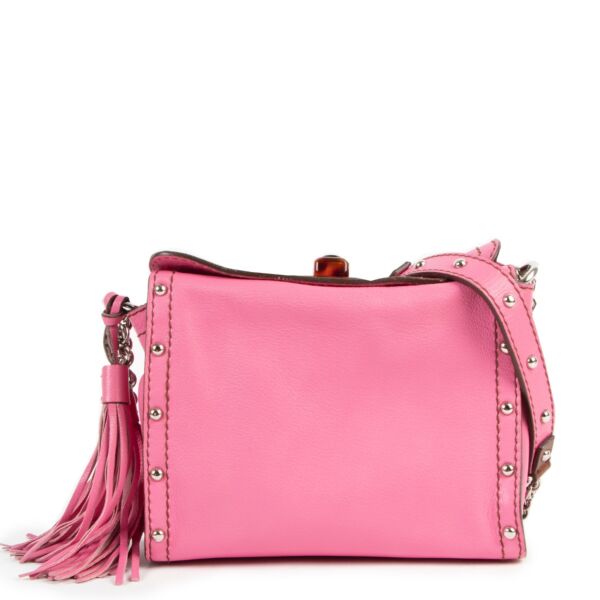 Buy online an authentic second hand Lanvin Pink leather tassel crossbody bag in very good condition at Labellov in Antwerp.