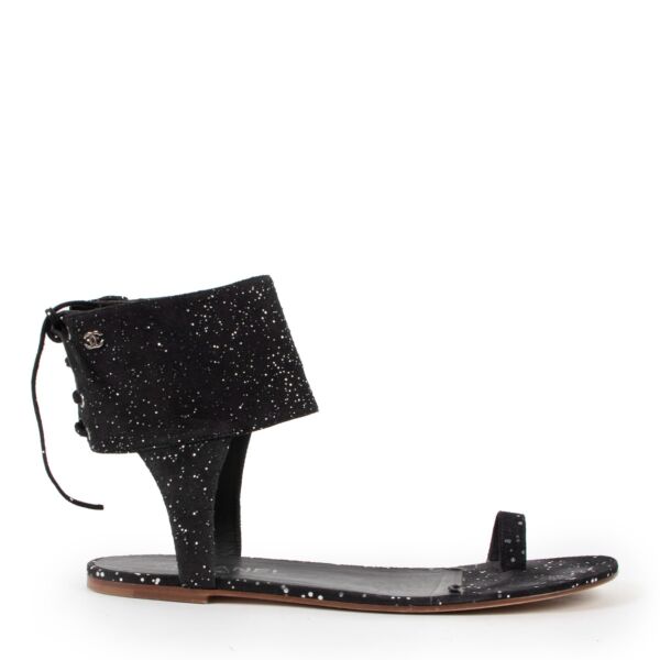 Buy an authentic pair of second hand Chanel 2012 Black Sandals Size 41 in very good condition at Labellov 