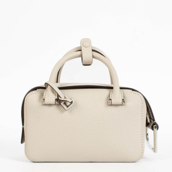 Authentic pre-loved Delvaux Sesame Taurillon Soft Cool Box Nano Bag on Labellov.com
