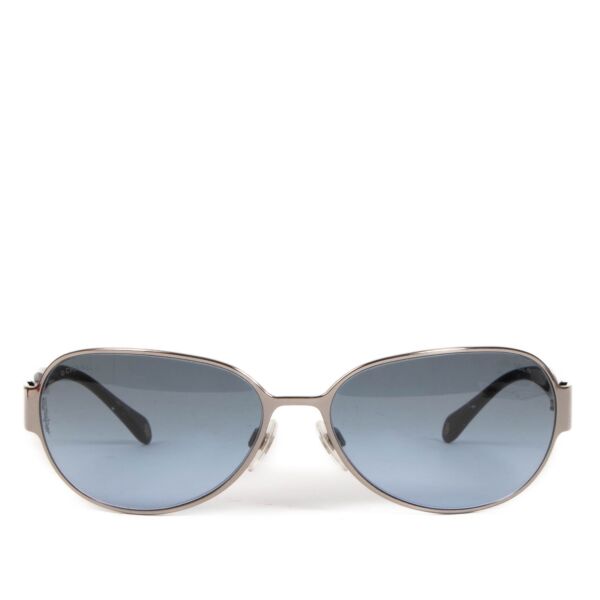 Shop safe online at Labellov in Antwerp, Brussels and Knokke these 100% authentic second hand Chanel Silver and Blue 4102 Sunglasses