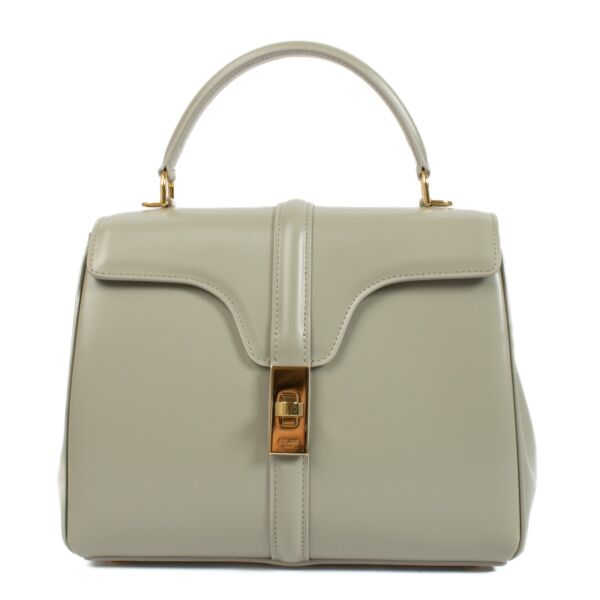 Celine Green Satinated Calfskin Small 16 Bag with gold-tone hardware, top handle, and detachable shoulder strap. Shop now at Labellov.