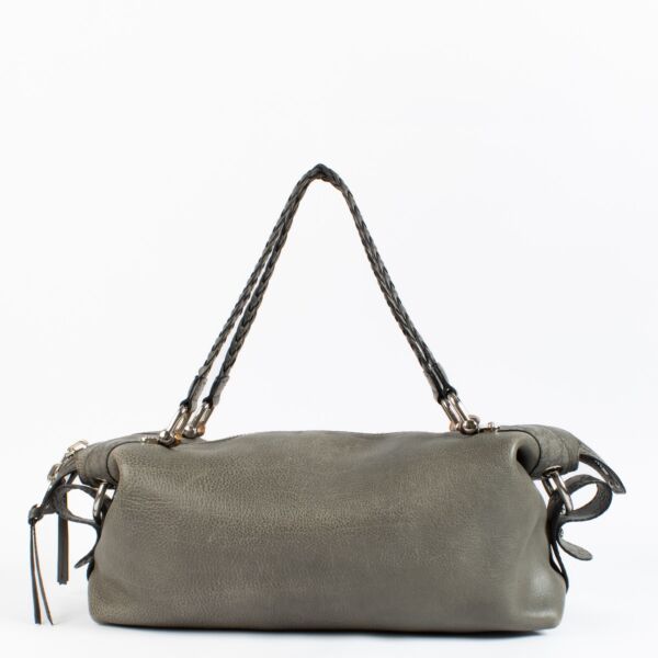 This bag is in very good pre-loved condition. The leather retains its supple texture with only minor softening from gentle use. Slight rubbing at the corners and faint creasing are consistent with careful wear. Hardware remains shiny with minimal signs of