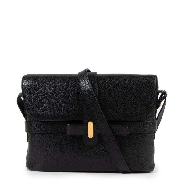 Buy online an authentic second hand Delvaux Simoun PM black leather crossbody bag in very good condition at Labellov in Antwerp. 