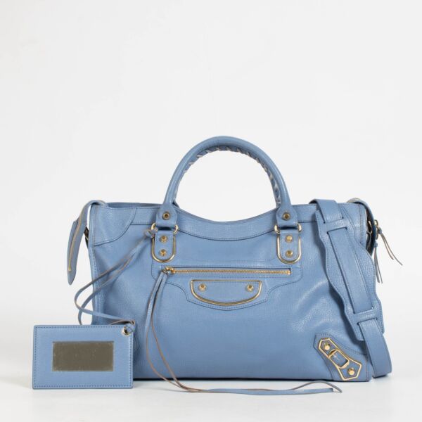Shop this authentic Balenciaga Blue City Bag pre-loved on Labellov.com 
