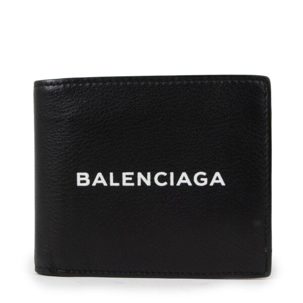 Buy an authentic second hand Balenciaga Black Leather Logo Print Square Folded Wallet in very good condition at Labellov 