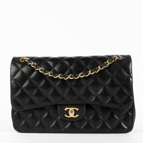 Chanel Black Jumbo Classic Flap Bag in lambskin with gold hardware at Labellov.com