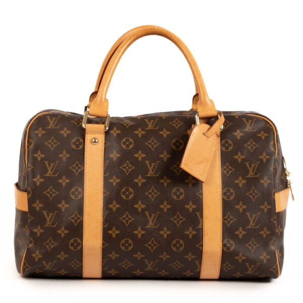 Shop safe online at Labellov in Antwerp, Brussels and Knokke this 100% authentic second hand Louis Vuitton Carryall Compact Travel Bag