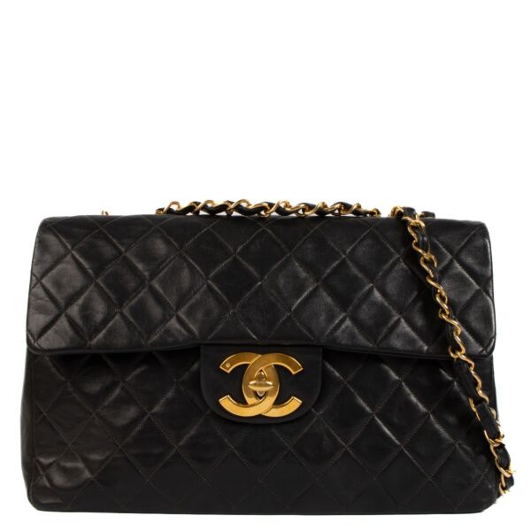 shop 100% authentic second hand Chanel Black Vintage Maxi Classic Flap Bag on Labellov.com