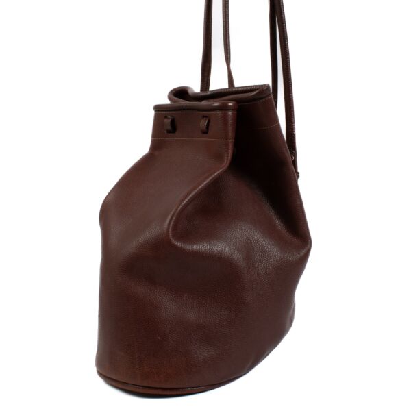 Discover the elegance of this deep Burgundy leather backpack, featuring a structured silhouette and luxurious gold hardware. Perfect for both everyday use and special occasions, this timeless designer piece adds sophistication to any outfit. Shop now on L