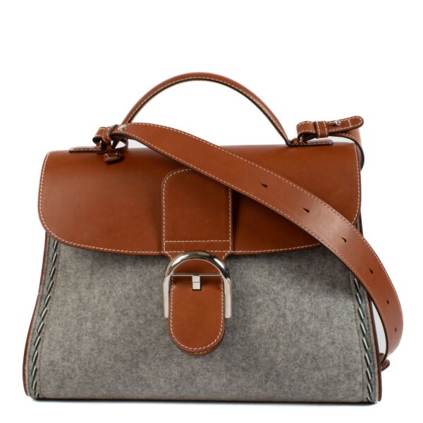We buy and sell your preloved and brand new designer Delvaux Grey Felt Siera Calf Brillant GM