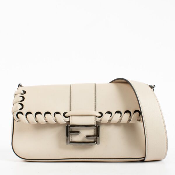 Fendi White Leather Whipstitch Baguette Bag with silver-tone FF hardware and leather strap at Labellov.com