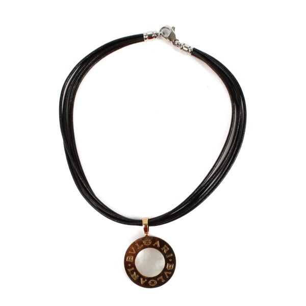 Shop safe online at Labellov in Antwerp, Brussels and Knokke this 100% authentic second hand Bulgari Mother Of Pearl Pendant Black Cord Necklace