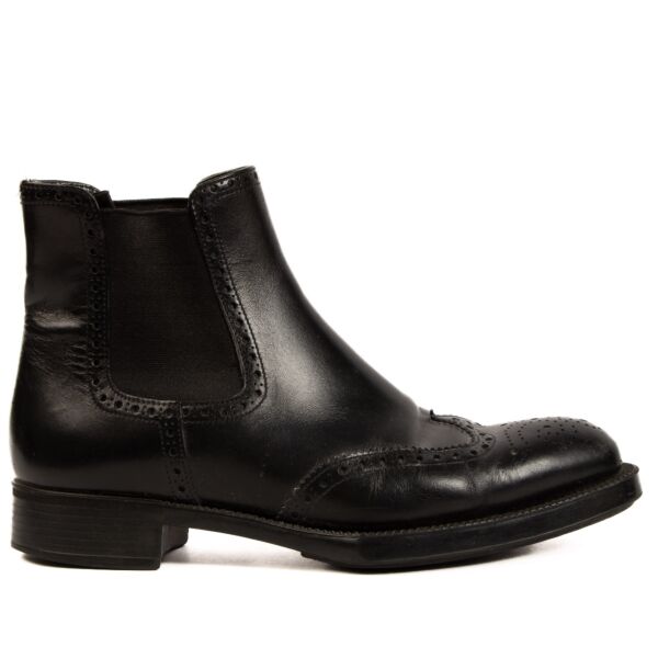 Buy 100% authentic Prada Black Ankle Chelsea Boots in Size 37 on LabelLov.com