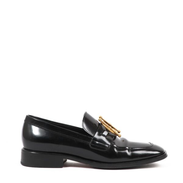 Buy authentic second-hand Christian Dior Black Glazed Calfskin Moccasins in Size 37 in very good condition at Labellov in Antwerp.