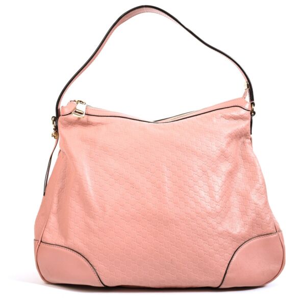 Shop safe online at Labellov in Antwerp, Brussels and Knokke this 100% authentic second hand Gucci Pink Microguccissima Large Bree Shoulder Bag