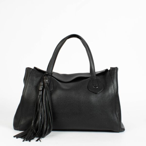 Authentic pre-loved Gucci Black Leather Lady Tassel Tote Bag on Labellov.com