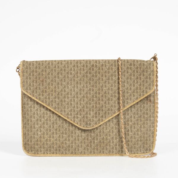 Shop the authentic pre-loved Christian Dior Gold Oblique Vintage Clutch on Labellov.com