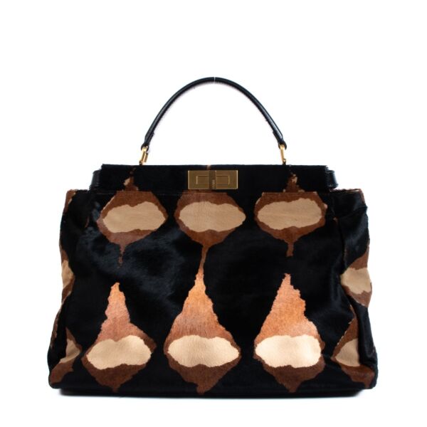 Fendi Peekaboo Bag + Strap. Buy authentic secondhand Fendi bags at Labellov vintage webshop for the lowest price. Koop authentieke tweedehands Fendi tassen bij Labellov vintage webshop aan de laagste prijs.