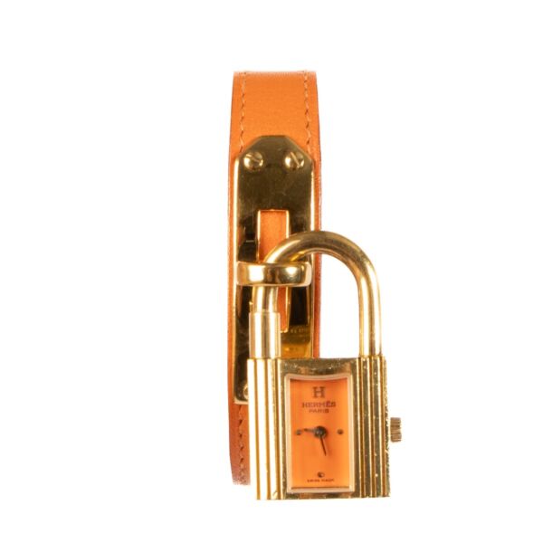 Shop safe online at Labellov in Antwerp, Brussels and Knokke this 100% authentic second hand Hermès Orange Gold Kelly watch