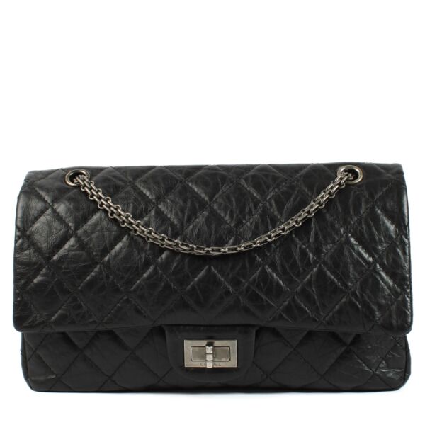 shop 100% authentic second hand Chanel Black Aged Calfskin Maxi 2.55 Bag on Labellov.com