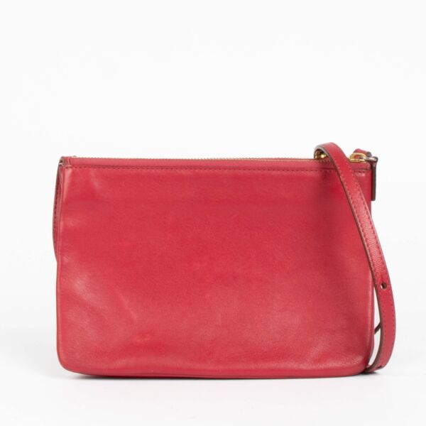 Shop this authentic Celine Raspberry Leather Trio Bag pre-loved on Labellov.com 