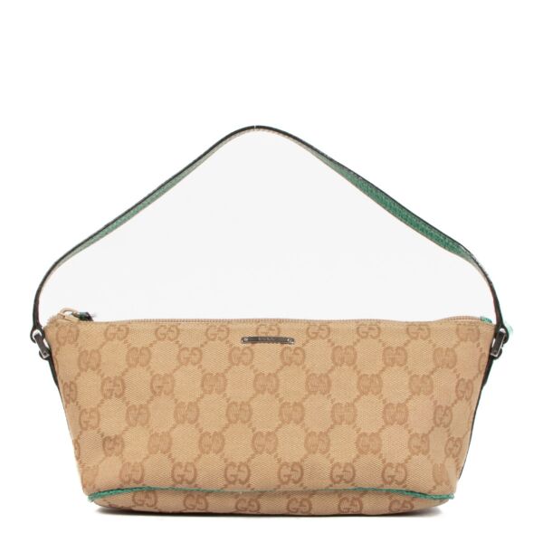 Shop a 100% authentic Gucci GG Monogram Canvas Mini Baguette Bag on Labellov.com
