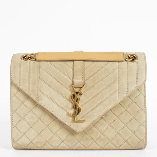 Shop the authentic Saint Laurent Beige Suede Medium Envelope Bag second hand on Labellov.com.