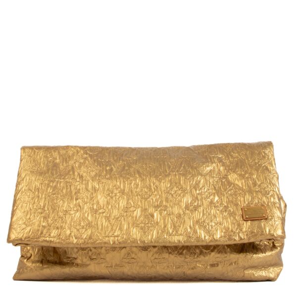Louis Vuitton Gold Limelight Clutch for the best price at Labellov secondhand luxury in Antwerp