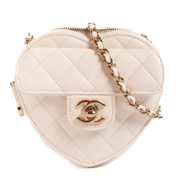 Shop 100% authentic second-hand Chanel 22S White Lambskin Heart Clutch With Chain on Labellov.com