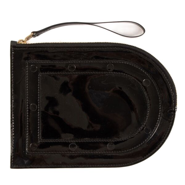 Buy an authentic Delvaux Black Patent Leather Louise Clutch on LabelLov.com