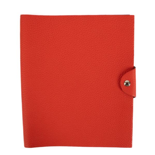 The Hermès Ulysse is a sleek leather notebook holder with a minimalist design, featuring luxurious craftsmanship and a spacious interior for essentials.