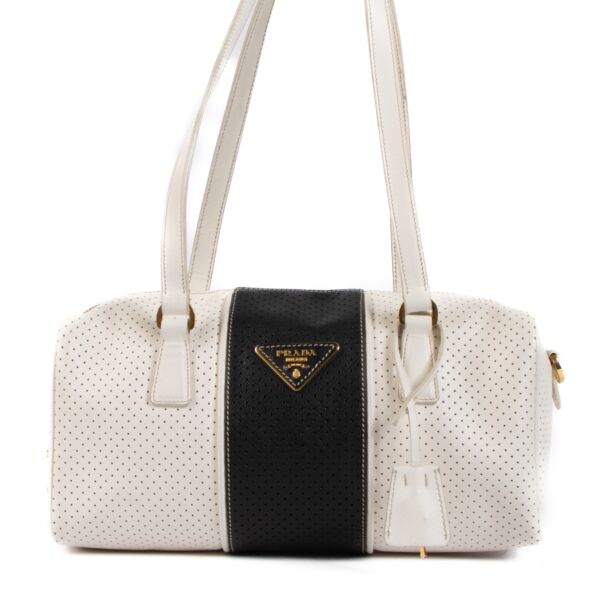 Shop 100% authentic second-hand Prada White/Black Perforated Saffiano Leather Boston Bag on Labellov.com