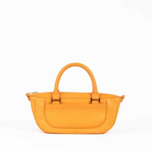 Authentic pre-loved Louis Vuitton Orange Epi Dhanura PM Top Handle Bag on Labellov.com